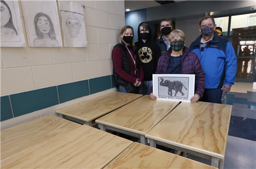 Family donates desks 